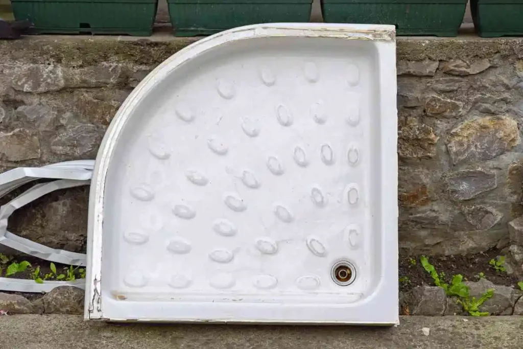 Corner shower pan base