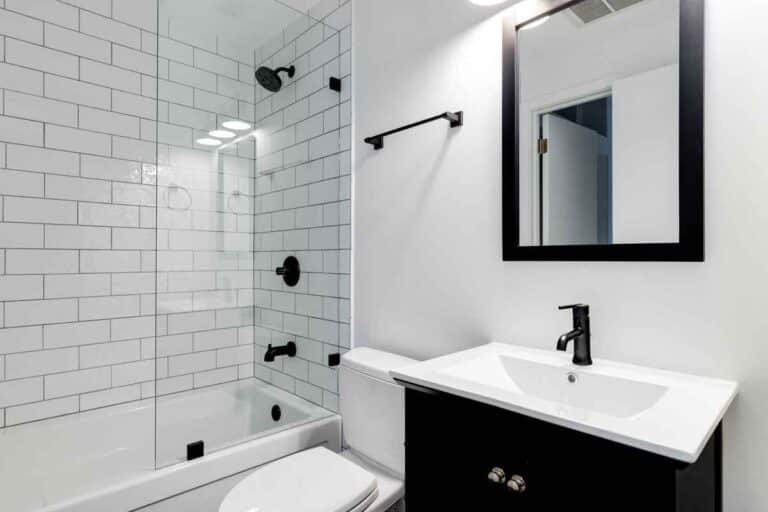 A small moderm bathroom vanity but the bathroom sink smell