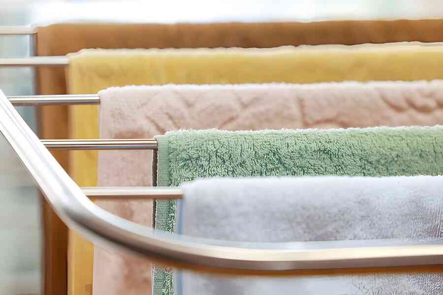 Bath towels hanged outside the bathroom